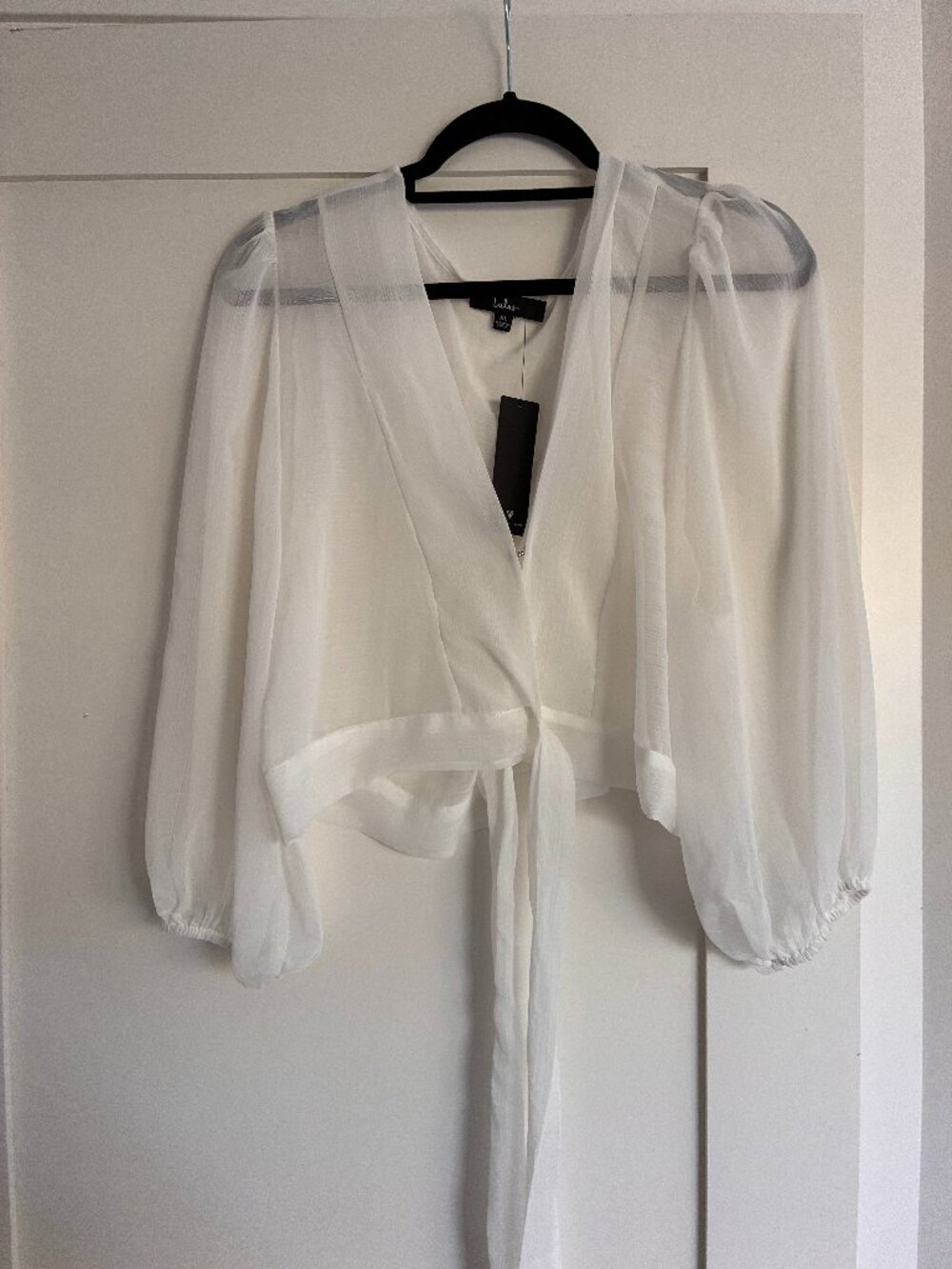 LuLus sheer white wrap top (NWT)